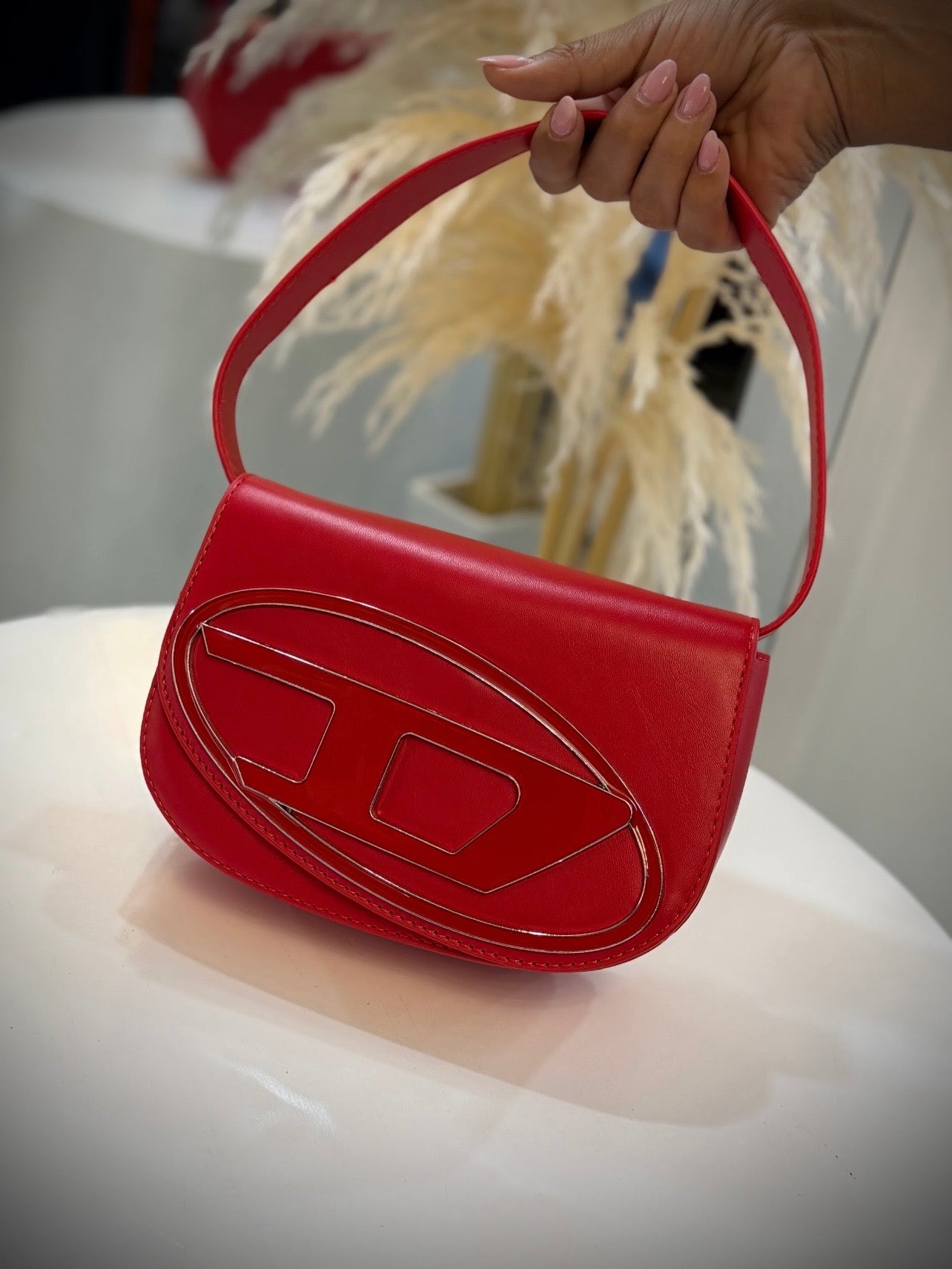 BOLSO DE MANO DIÉSEL ROJO
