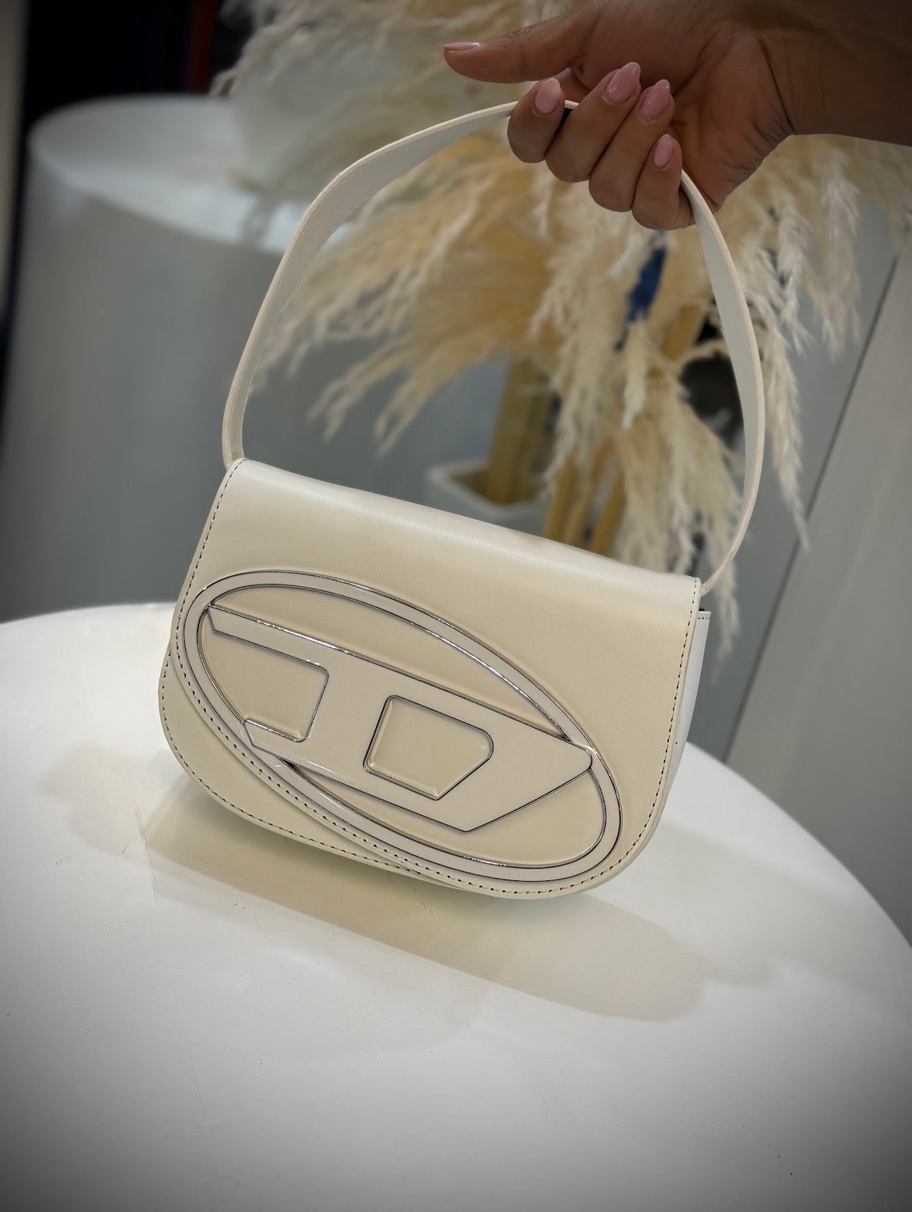 BOLSO DE MANO DIÉSEL BLANCO