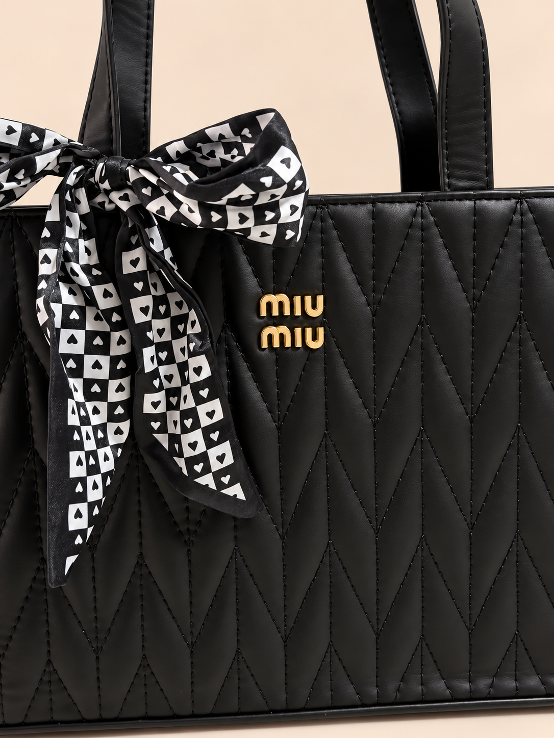 BOLSO DE MANO MIU MIU NEGRO